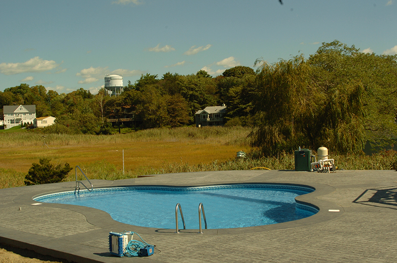 Swimming pool and stamped concrete project example 111